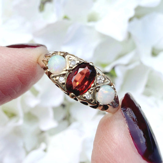 Lucie 9ct Gold Garnet Opal and Diamond Trilogy Ring