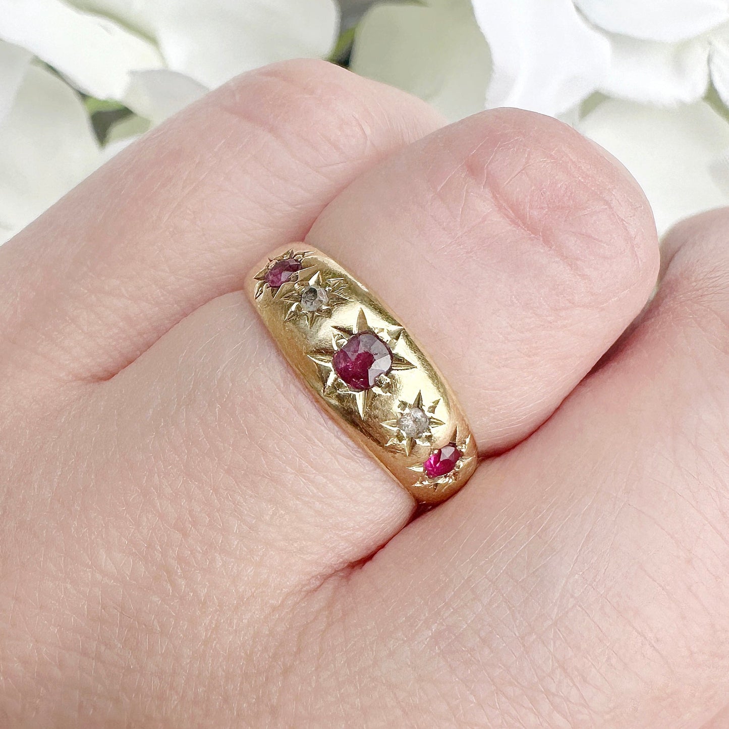 Edwardian 18ct gold ruby and diamond starburst gypsy ring