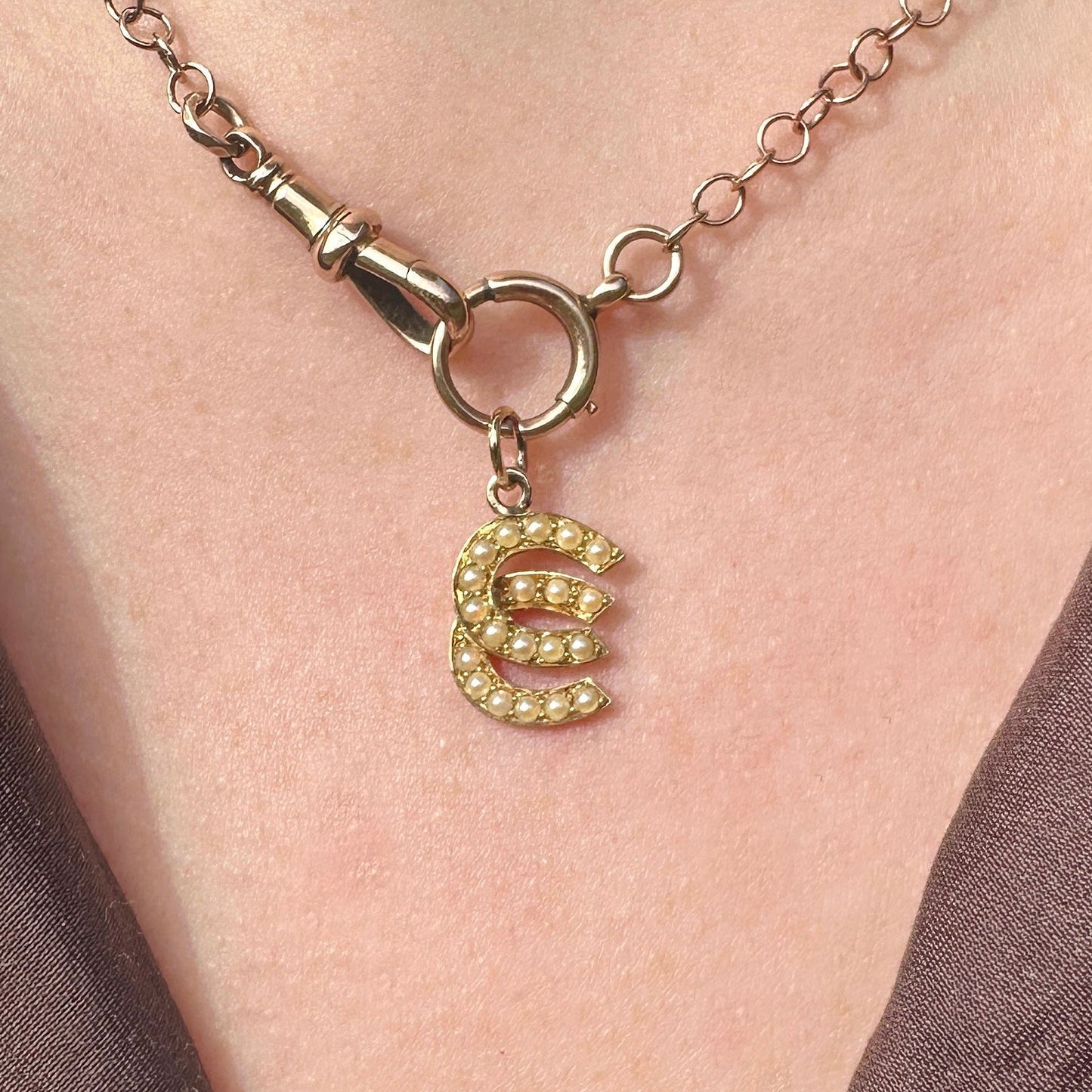 18ct gold pearl double lucky horseshoe charm