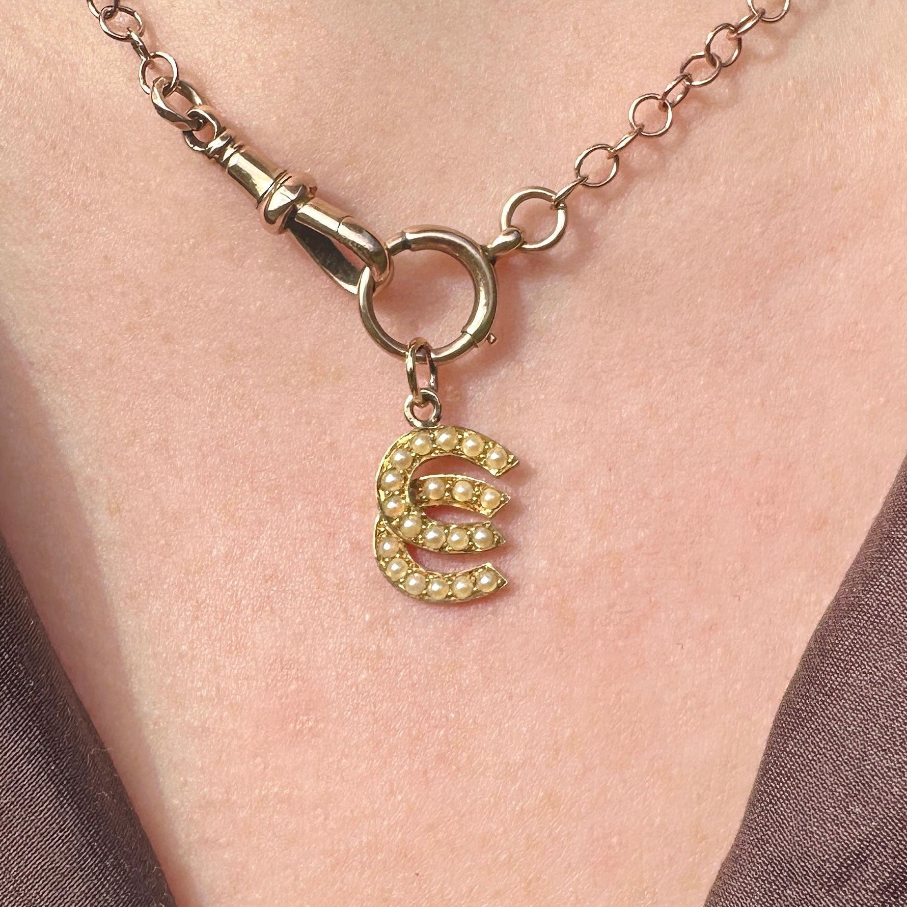 18ct gold pearl double lucky horseshoe charm