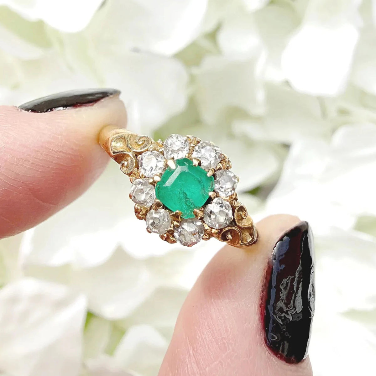 asscher cut emerald ring