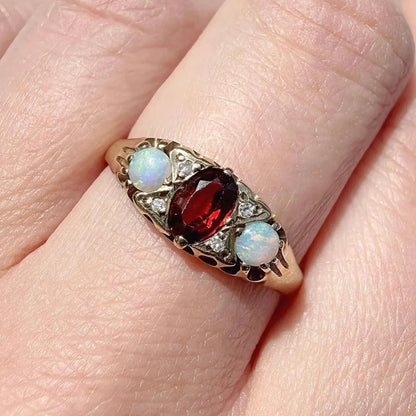 Lucie  9ct Gold Garnet Opal and Diamond Trilogy Ring