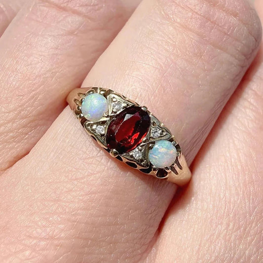Lucie  9ct Gold Garnet Opal and Diamond Trilogy Ring