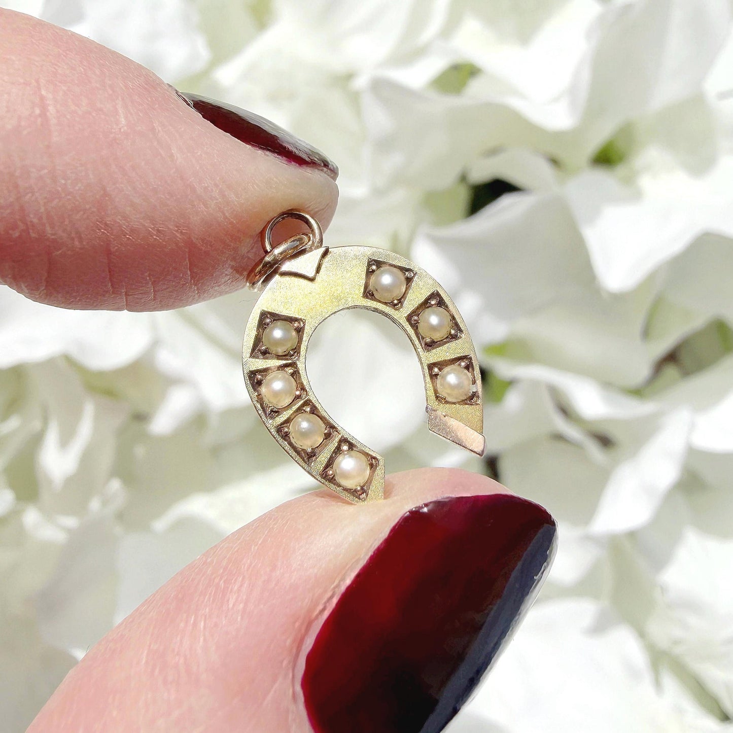 gold and seed pearl lucky horseshoe charm