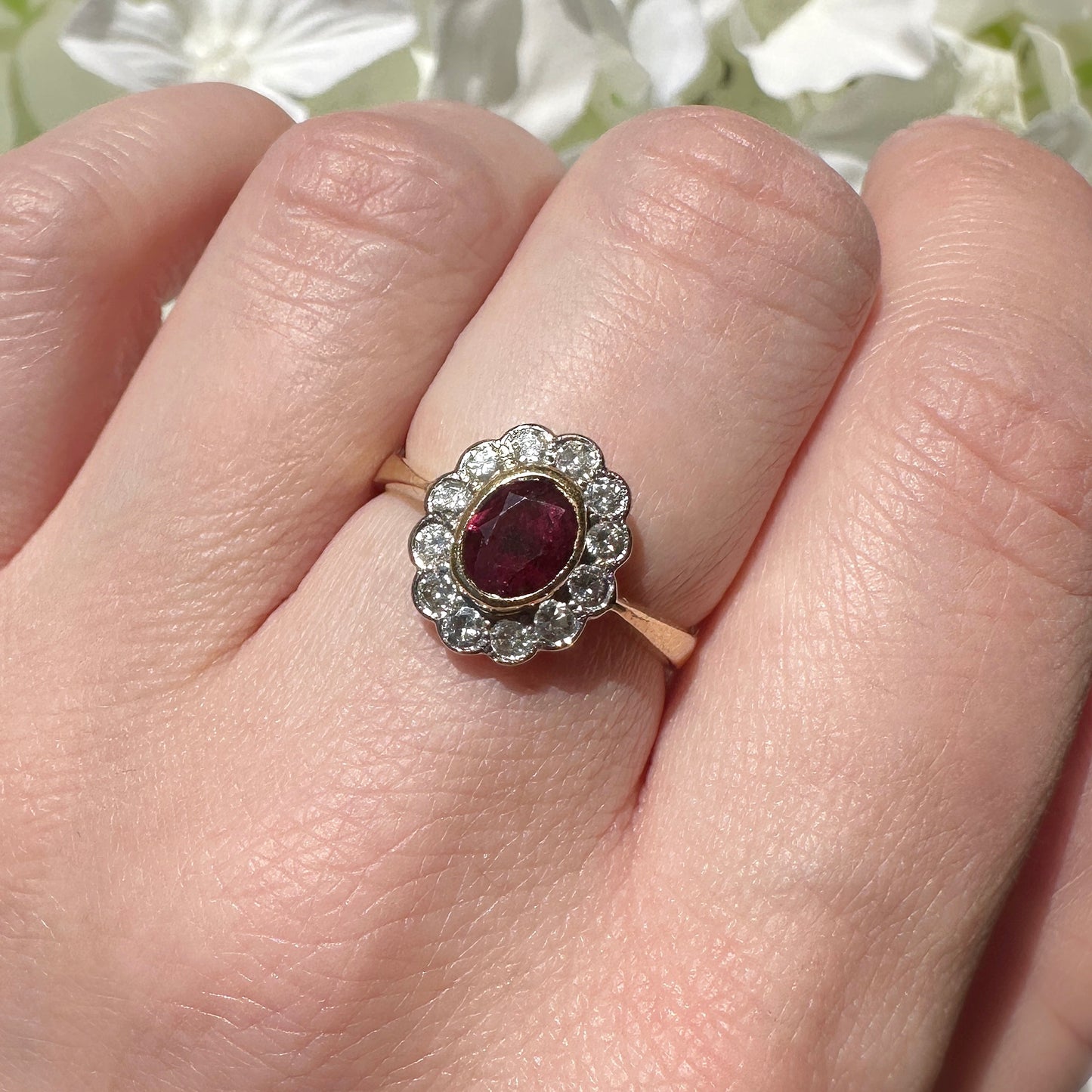 ruby and diamond cluster engagement ring.