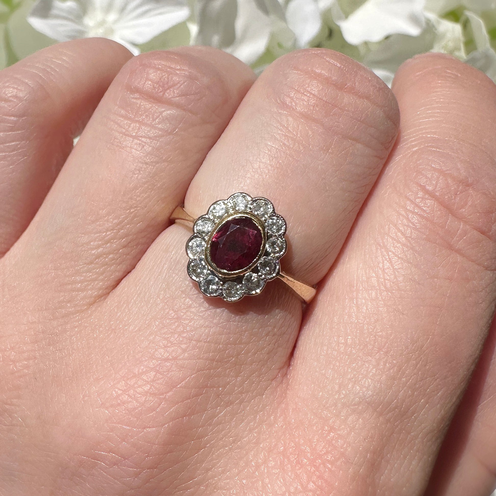 ruby and diamond cluster engagement ring.