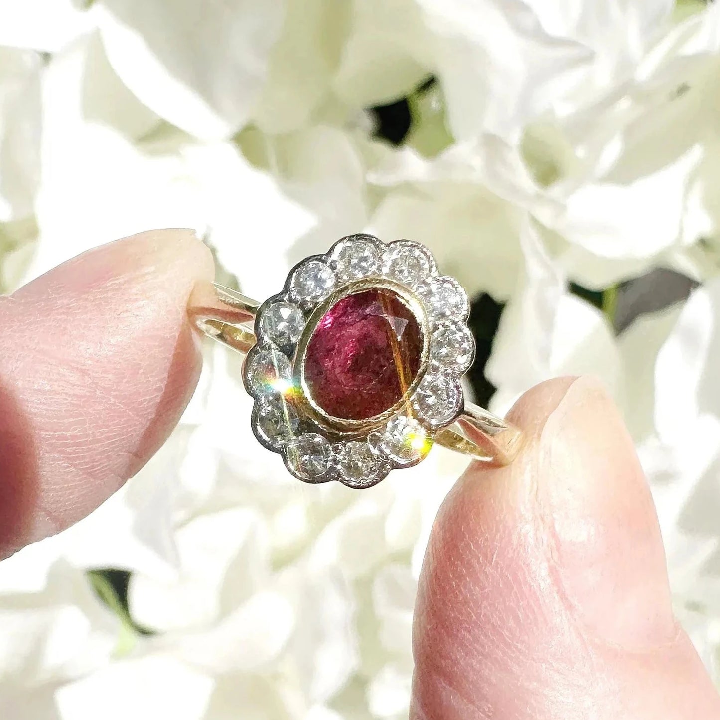 ruby and diamond cluster engagement ring