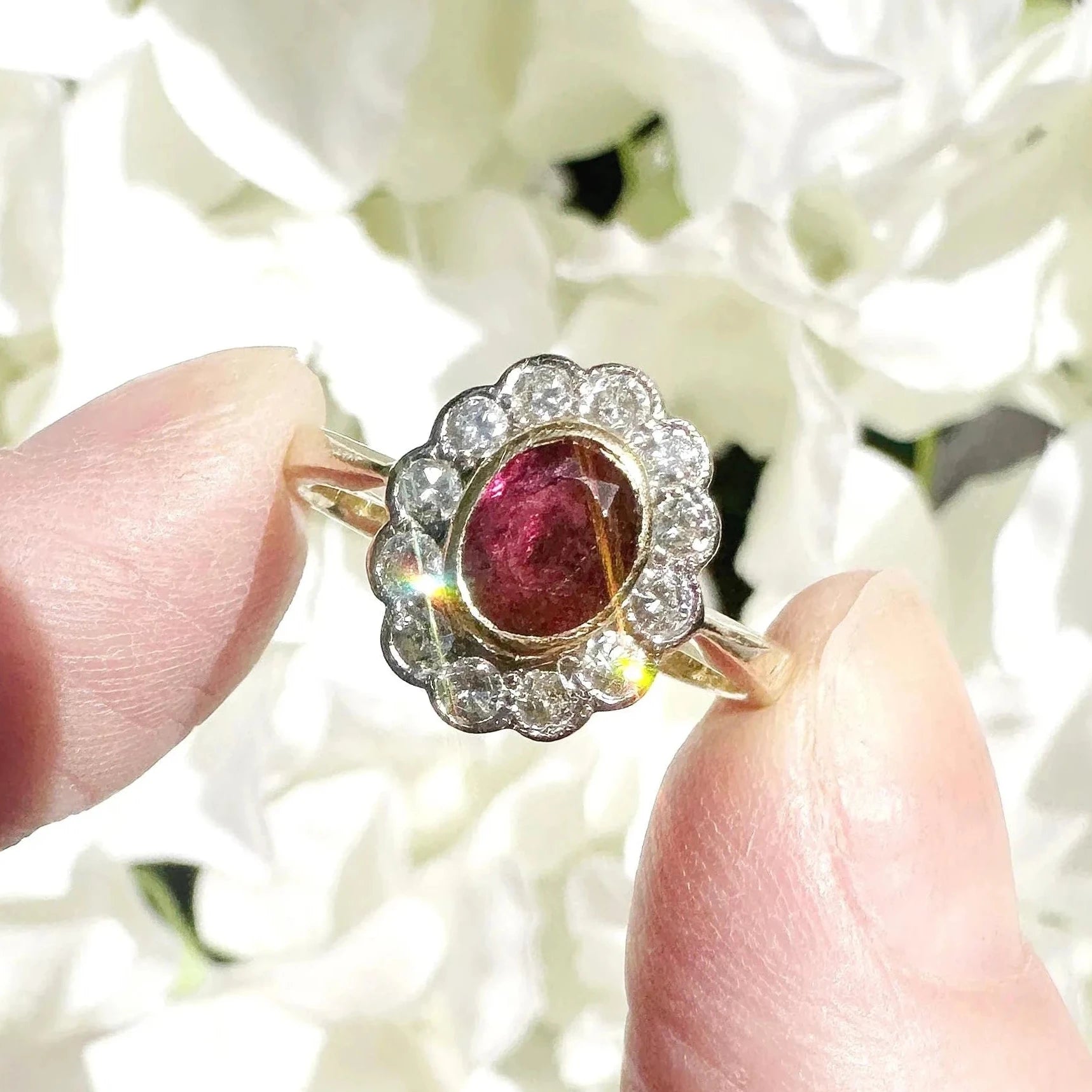 ruby and diamond cluster engagement ring