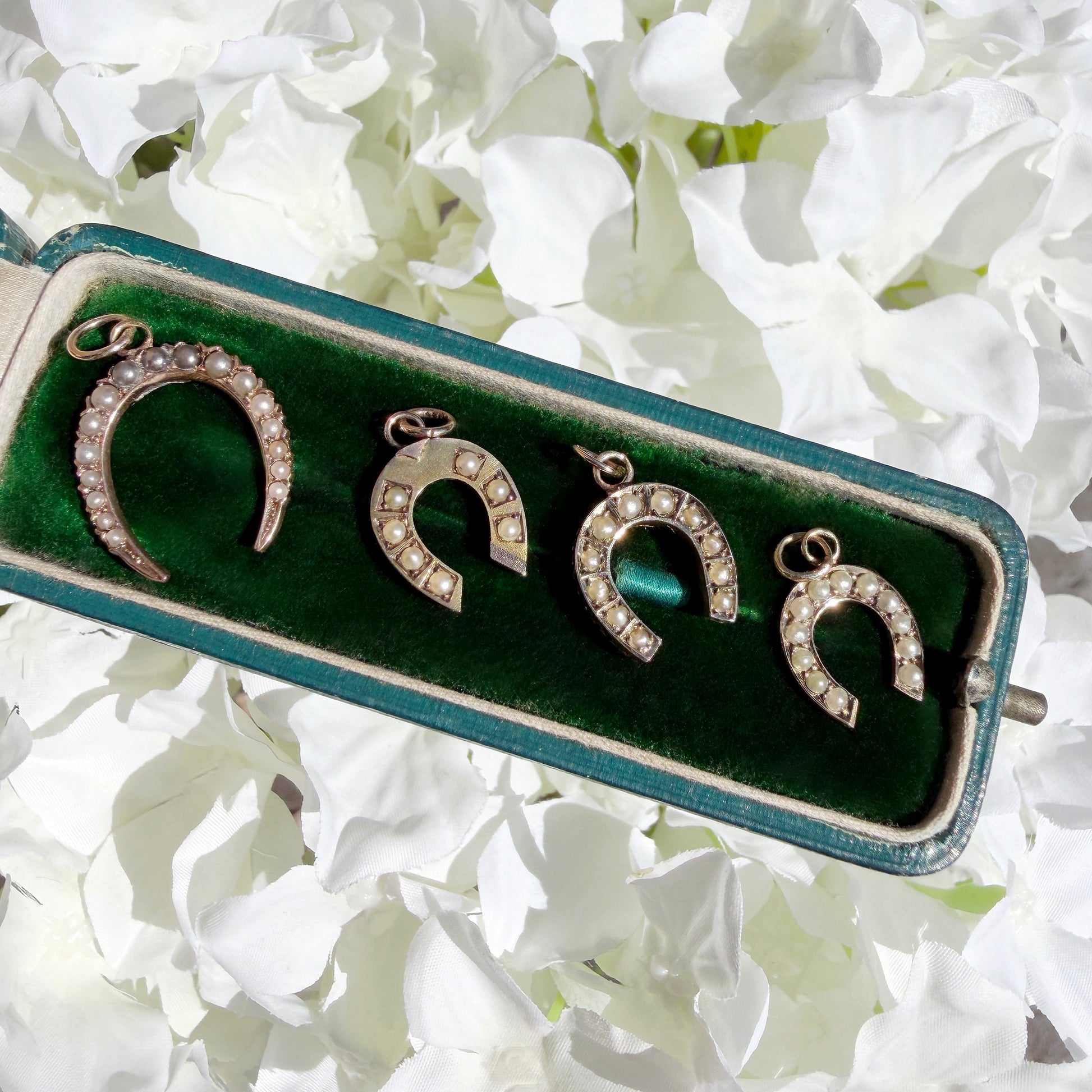gold and seed pearl lucky horseshoe charm